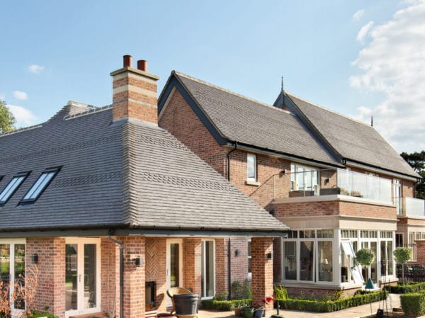 Rustic home with clay roofing