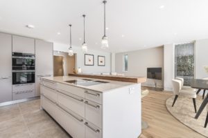 White open plan kitchen and dining area