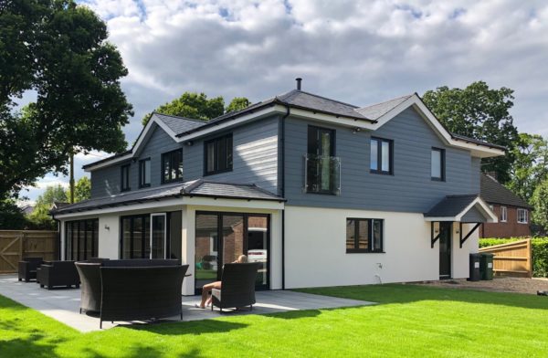 White render and clad house