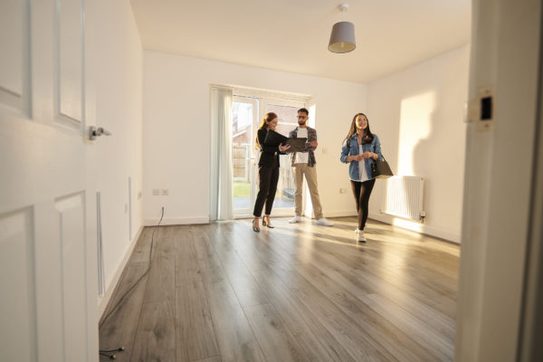 People inspecting the interior of a home