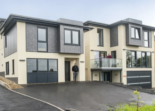 Two High-Performance Timber Frame Homes on One Plot